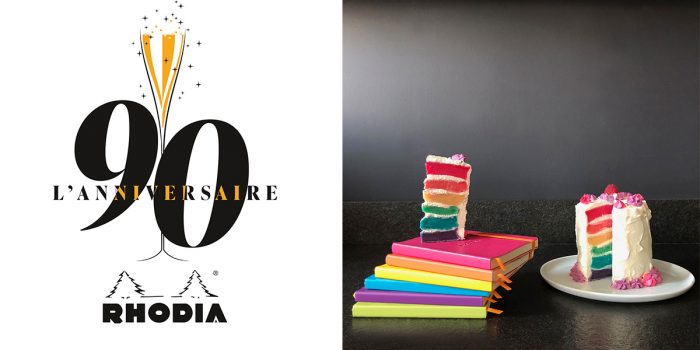 90 Jahre Rhodia mit farbigen übereinandergestapelten Notizbüchern und einer bunten Torte.